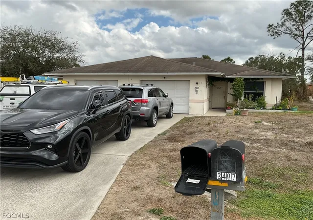 Photo 2 of Multi family home for sale at 2405/2407 Vernon Ave S, Lehigh Acres, FL 33973 | MLS# 2026010600 | Listing updated on 2026-09-04