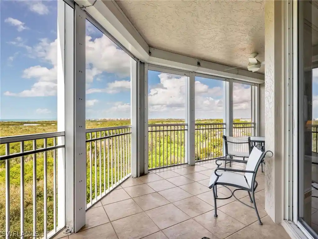 Listing Photo 1 - Condo for sale in 1001 Arbor Lake Dr located at 1001 Arbor Lake Dr, Naples, FL 34110 - Unit #707