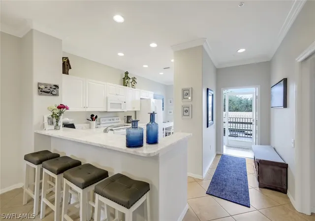 Listing Photo 5 - Condo for sale in building located at 8253 Parkstone Pl, Naples, FL 34120 - Unit #206