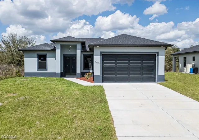 Photo 1 of Single family home for sale at 2604 73rd Street W, Lehigh Acres, FL 33971 | MLS# 2026011465 | Listing updated on 2026-10-13