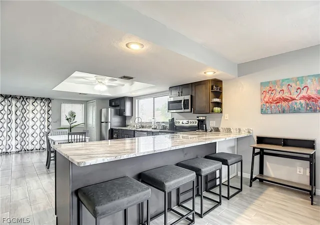 Photo 3 of Multi family home for sale at 4928/5000 Sw 16th Place, Cape Coral, FL 33914 | MLS# 2026011492 | Listing updated on 2026-09-17