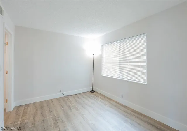 Listing Photo 2 - Condo for sale in building located at 123 Palm Dr, Naples, FL 34112 - Unit #2865