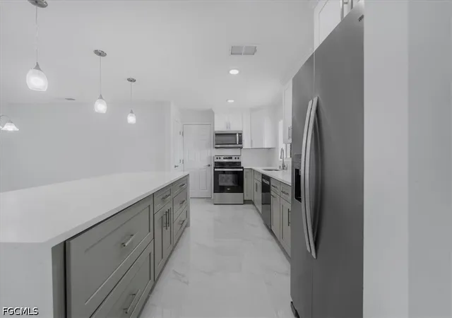 Photo 3 of Single family home for sale at 105 SE 45th Terrace, Cape Coral, FL 33904 | MLS# 2026012100 | Listing updated on 2026-09-04