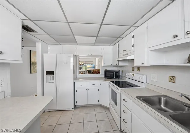 Listing Photo 4 - Condo for sale in building located at 1318 Myerlee Country Clb Blvd, Fort Myers, FL 33919 - Unit #3