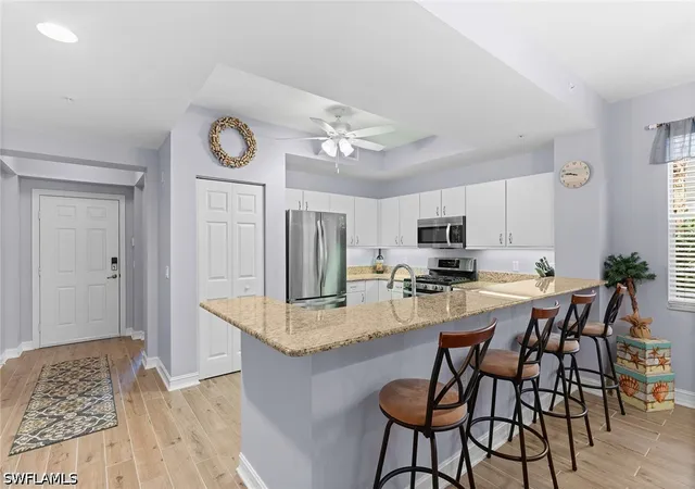 Listing Photo 5 - Condo for sale in building located at 1882 Tarpon Bay Dr S, Naples, FL 34119 - Unit #101
