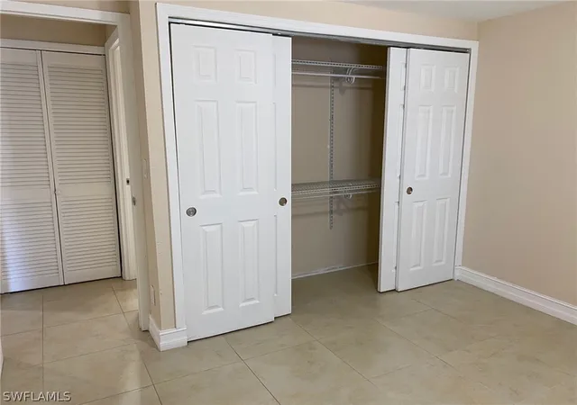 Listing Photo 4 - Condo for sale in building located at 5389 Treetops Dr, Naples, FL 34113