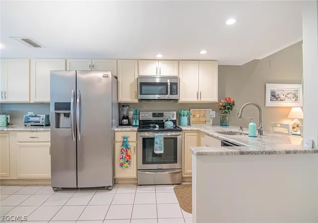 Listing Photo 4 - Condo for sale in building located at 3711 Del Prado Blvd S, Cape Coral, FL 33904 - Unit #8