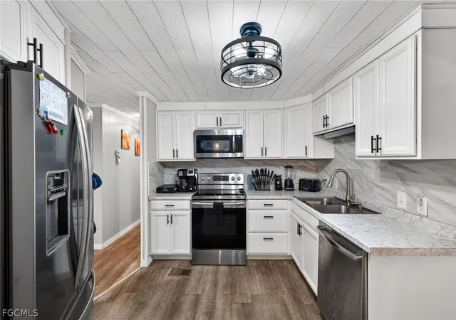 Photo 1 of Manufactured home for sale at 860 Moonlight Dr, North Fort Myers, FL 33917 | MLS# 2026013595 | Listing updated on 2026-09-16