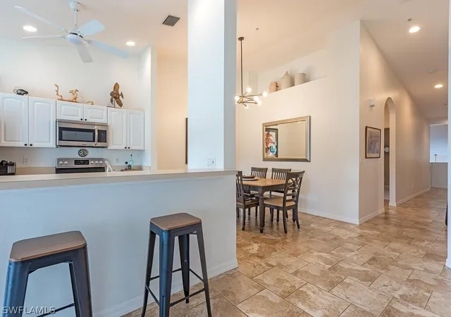 Listing Photo 5 - Condo for sale in building located at 2880 Cypress Trace Cir, Naples, FL 34119 - Unit #202