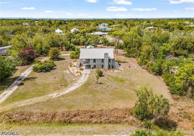 Photo 1 of Single family home for sale at 8677 Whispering Pines Dr, Saint James City, FL 33956 | MLS# 2026014958 | Listing updated on 2026-09-02