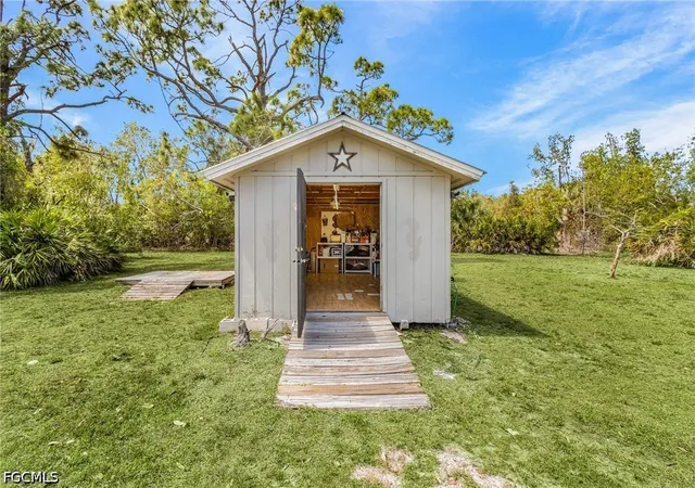 Photo 4 of Single family home for sale at 8677 Whispering Pines Dr, Saint James City, FL 33956 | MLS# 2026014958 | Listing updated on 2026-09-02
