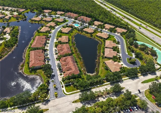 Listing Photo 1 - Condo for sale in building located at 9060 Triangle Palm Ln, Fort Myers, FL 33913 - Unit #1206