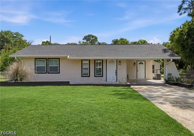 Photo 1 of Single family home for sale at 1702 E 6th Street, Lehigh Acres, FL 33972 | MLS# 2026016823 | Listing updated on 2026-09-15