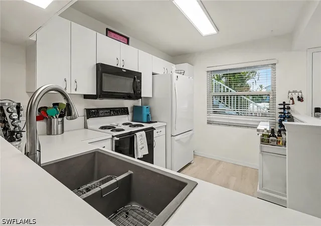 Photo 4 of Condo for sale at 14501 Lakewood Tr Ct #103, Fort Myers, FL 33919 | MLS# 226014978 | Listing updated on 2026-09-15