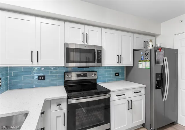 Listing Photo 4 - Condo for sale in building located at 8940 Colonnades Ct E, Bonita Springs, FL 34135 - Unit #713