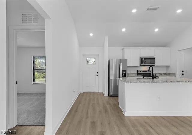 Photo 3 of Single family home for sale at 724 Goldrock Rd, Lehigh Acres, FL 33974 | MLS# 2026017873 | Listing updated on 2026-10-13