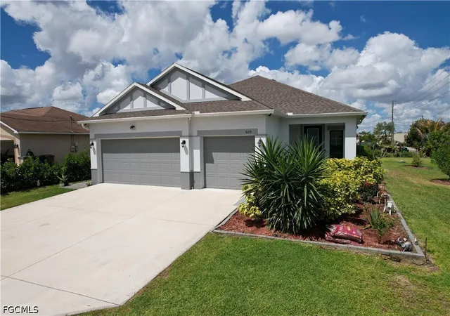 Photo 2 of Sale Pending at 605 Norman Ave, Lehigh Acres, FL 33971 | MLS# 2026018097 | Listing updated on 2026-09-12