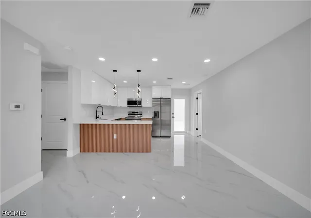 Photo 3 of Single family home for sale at 1042 Darlington St, Lehigh Acres, FL 33974 | MLS# 2026018332 | Listing updated on 2026-09-15
