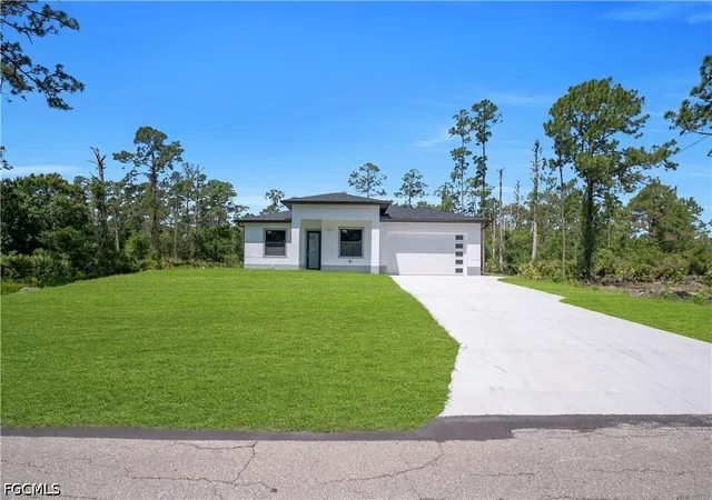 Photo 2 of Single family home for sale at 1009 Moore Ave, Lehigh Acres, FL 33972 | MLS# 2026018350 | Listing updated on 2026-09-02