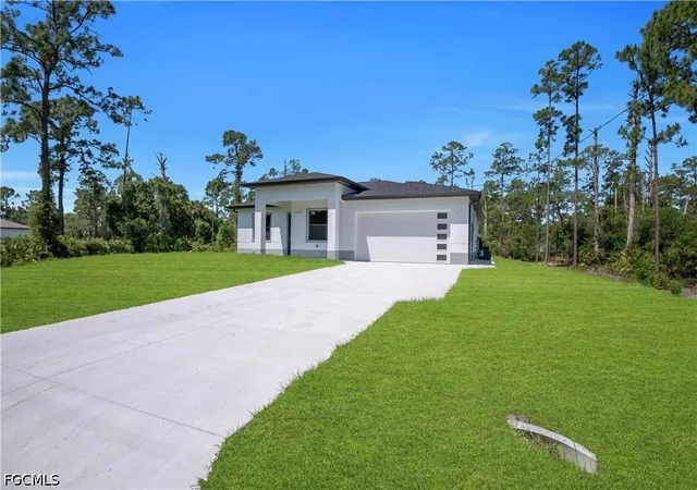 Photo 3 of Single family home for sale at 1009 Moore Ave, Lehigh Acres, FL 33972 | MLS# 2026018350 | Listing updated on 2026-09-02