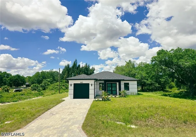 Photo 4 of Sale Pending at 1411 Moore Ave, Lehigh Acres, FL 33972 | MLS# 226017323 | Listing updated on 2026-10-20