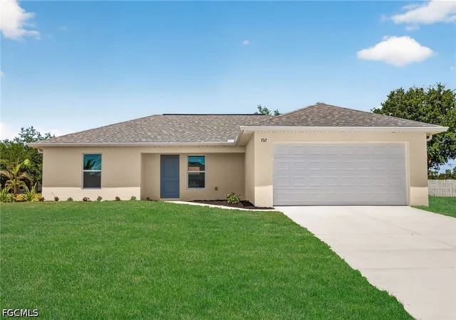 Photo 1 of Single family home for sale at 702 Nw Douglas Cir, Cape Coral, FL 33993 | MLS# 2026019349 | Listing updated on 2026-10-20