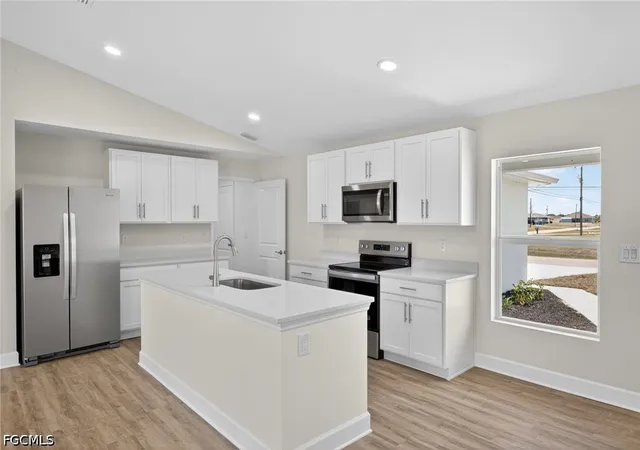 Photo 1 of Single family home for sale at 702 NW Douglas Cir, Cape Coral, FL 33993 | MLS# 2026019349 | Listing updated on 2026-10-20