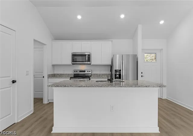 Photo 3 of Single family home for sale at 305 NW 23rd Terrace, Cape Coral, FL 33993 | MLS# 2026019848 | Listing updated on 2026-10-21
