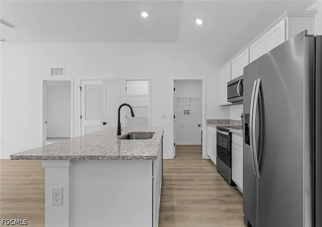 Photo 4 of Single family home for sale at 305 NW 23rd Terrace, Cape Coral, FL 33993 | MLS# 2026019848 | Listing updated on 2026-10-21