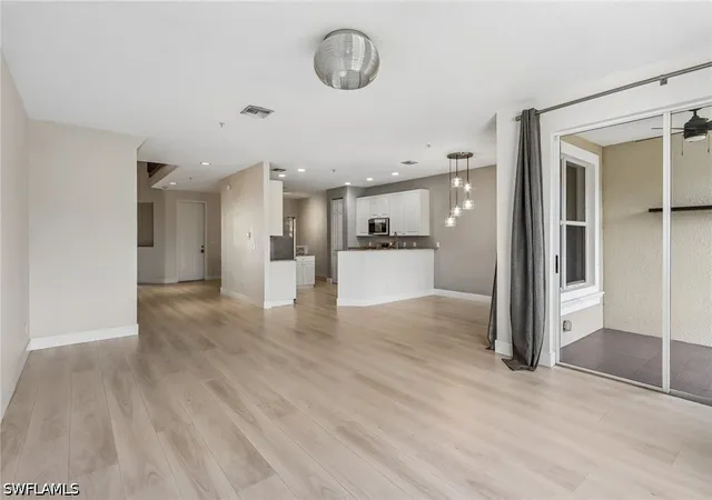 Photo 3 of Townhouse for sale at 1410 Mariposa Cir #102, Naples, FL 34105 | MLS# 226017077 | Listing updated on 2026-09-16