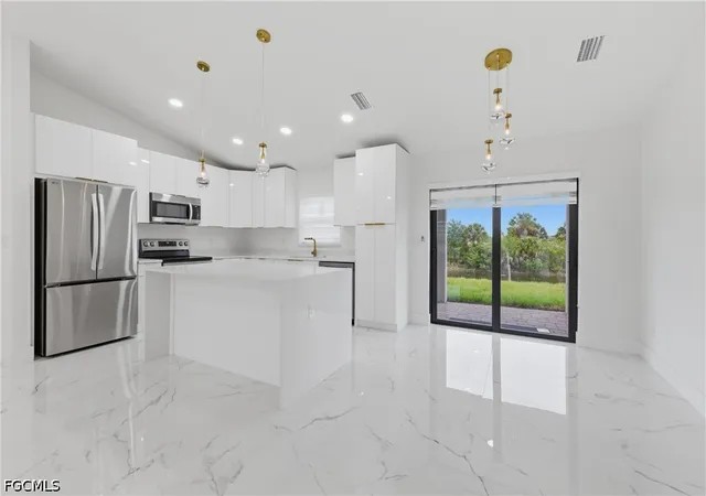 Photo 4 of Single family home for sale at 2201 NE 10th Place, Cape Coral, FL 33909 | MLS# 2026020175 | Listing updated on 2026-09-05