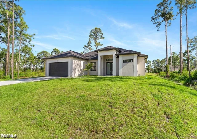 Photo 3 of Single family home for sale at 722 Phelps St E, Lehigh Acres, FL 33974 | MLS# 2026020183 | Listing updated on 2026-09-11