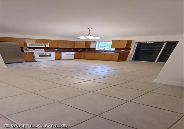 Photo 2 of Single family home for sale at 2330 Della Dr, Naples, FL 34117 | MLS# 226018132 | Listing updated on 2026-09-13