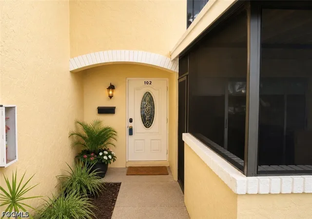 Photo 1 of Townhouse for sale at 102 E Greens Blvd, Lehigh Acres, FL 33936 | MLS# 2026020629 | Listing updated on 2026-10-15