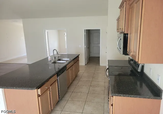 Photo 3 of Sale Pending at 1852 Valmont St, Lehigh Acres, FL 33972 | MLS# 2026020663 | Listing updated on 2026-09-10