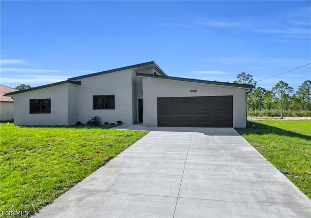 Photo 2 of Single family home for sale at 1009 State Ave, Lehigh Acres, FL 33972 | MLS# 2026020818 | Listing updated on 2026-09-04