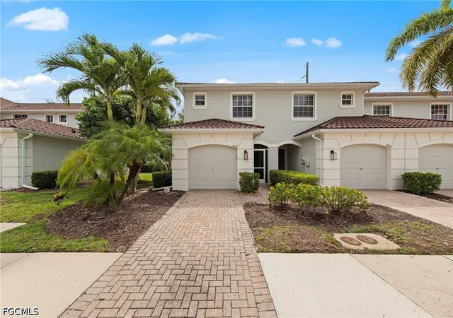 Photo 1 of Townhouse for sale at 8587 Athena Ct, Lehigh Acres, FL 33971 | MLS# 2026021180 | Listing updated on 2026-09-03