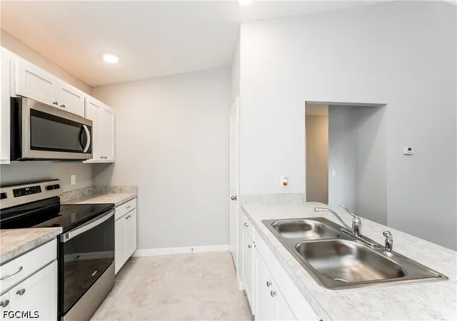 Photo 4 of Single family home for sale at 1222 Summa Blvd, Lehigh Acres, FL 33974 | MLS# 2026021182 | Listing updated on 2026-10-29