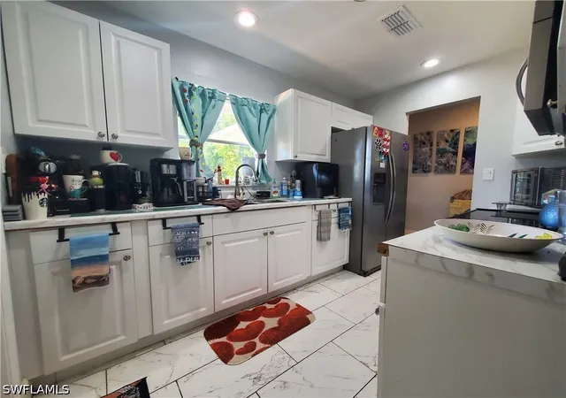 Photo 3 of Single family home for sale at 306 Hollywood St, Lehigh Acres, FL 33936 | MLS# 226018172 | Listing updated on 2026-09-15