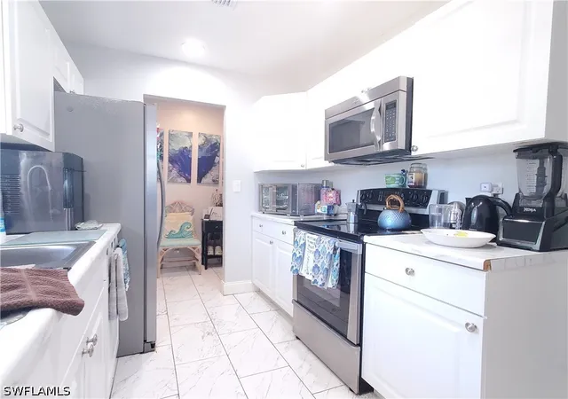 Photo 4 of Single family home for sale at 306 Hollywood St, Lehigh Acres, FL 33936 | MLS# 226018172 | Listing updated on 2026-09-15