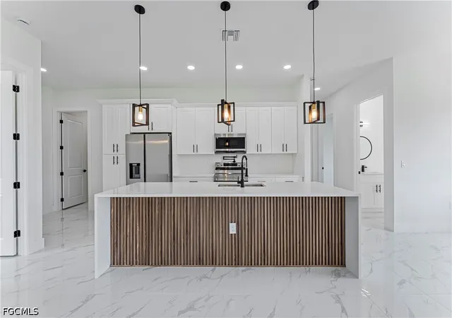 Photo 4 of Single family home for sale at 718 Phelps St E, Lehigh Acres, FL 33974 | MLS# 2026021684 | Listing updated on 2026-09-11