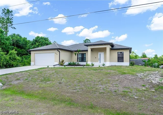 Photo 1 of Single family home for sale at 605 E 11th Street, Lehigh Acres, FL 33972 | MLS# 226019553 | Listing updated on 2026-09-11