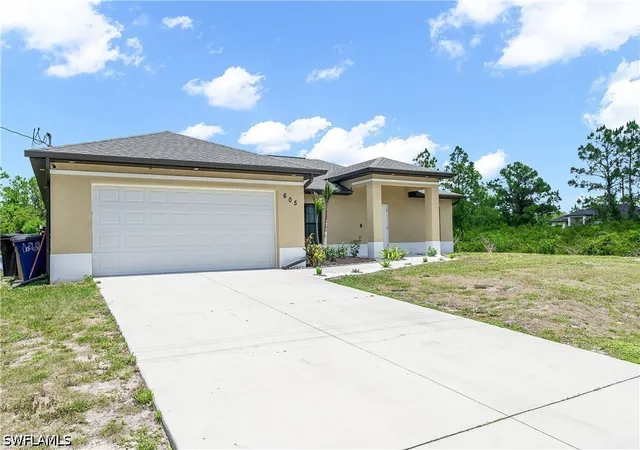 Photo 2 of Single family home for sale at 605 E 11th Street, Lehigh Acres, FL 33972 | MLS# 226019553 | Listing updated on 2026-09-11