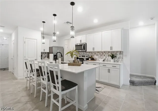 Photo 3 of Townhouse for sale at 1451 Weeping Willow Ct, Cape Coral, FL 33909 | MLS# 2026022437 | Listing updated on 2026-09-11