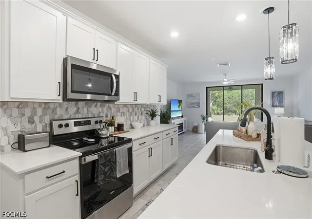 Photo 4 of Townhouse for sale at 1451 Weeping Willow Ct, Cape Coral, FL 33909 | MLS# 2026022437 | Listing updated on 2026-09-11