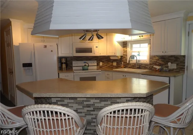 Photo 2 of Manufactured home for sale at 242 Shrub Ln N, North Fort Myers, FL 33917 | MLS# 2026022547 | Listing updated on 2026-10-15