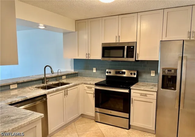 Listing Photo 4 - Condo for sale in building located at 865 New Waterford Dr, Naples, FL 34104 - Unit #S101