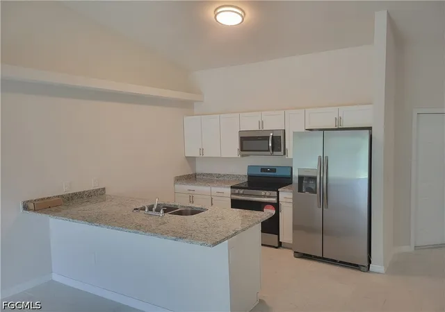 Listing Photo 4 - Condo for sale in building located at 217/219 Cape Coral Pkwy W, Cape Coral, FL 33914