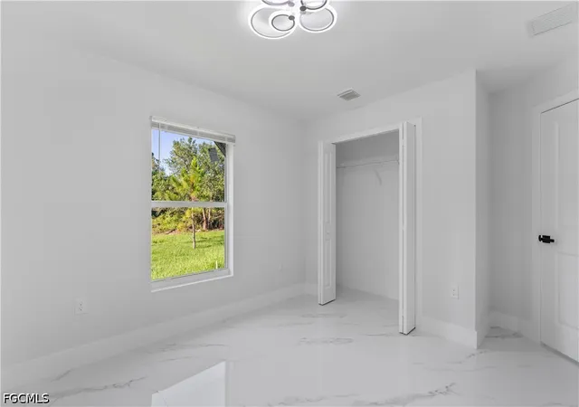 Photo 3 of Sale Pending at 940 Berg St E, Lehigh Acres, FL 33974 | MLS# 2026022798 | Listing updated on 2026-09-09