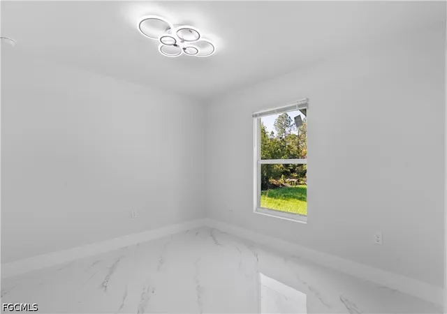 Photo 3 of Sale Pending at 940 Berg St E, Lehigh Acres, FL 33974 | MLS# 2026022798 | Listing updated on 2026-09-09